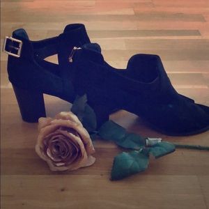 Black and gold buckle heels